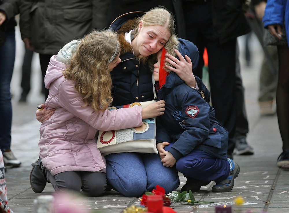 Brussels attacks woman and children mourning